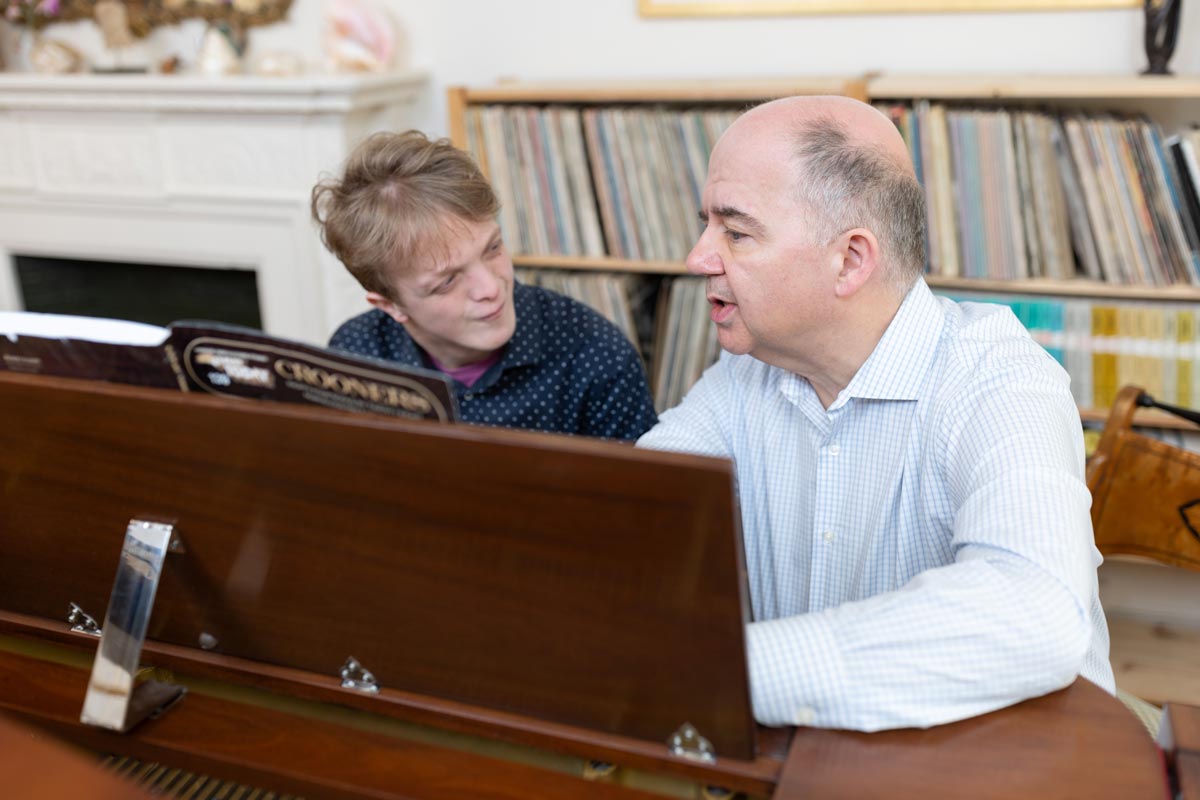Peter Muir with John in a lesson