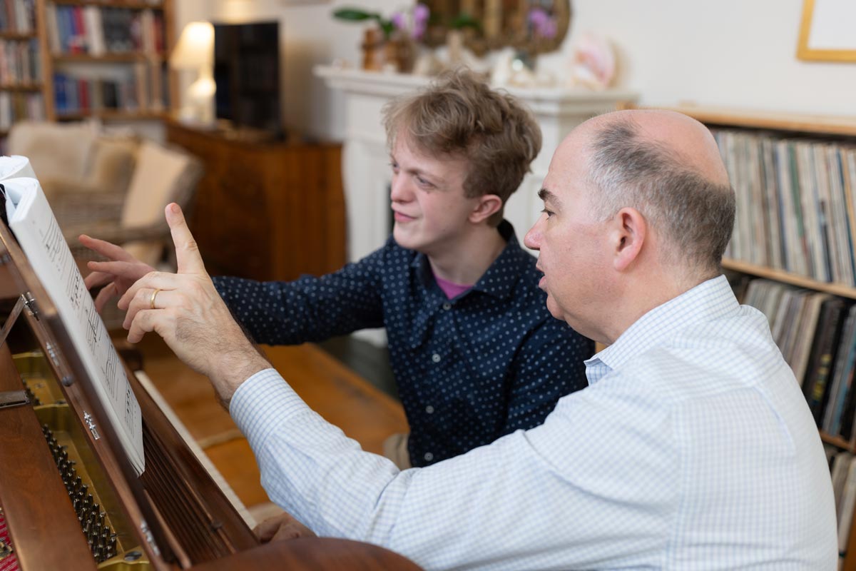 Peter Muir with John in a lesson