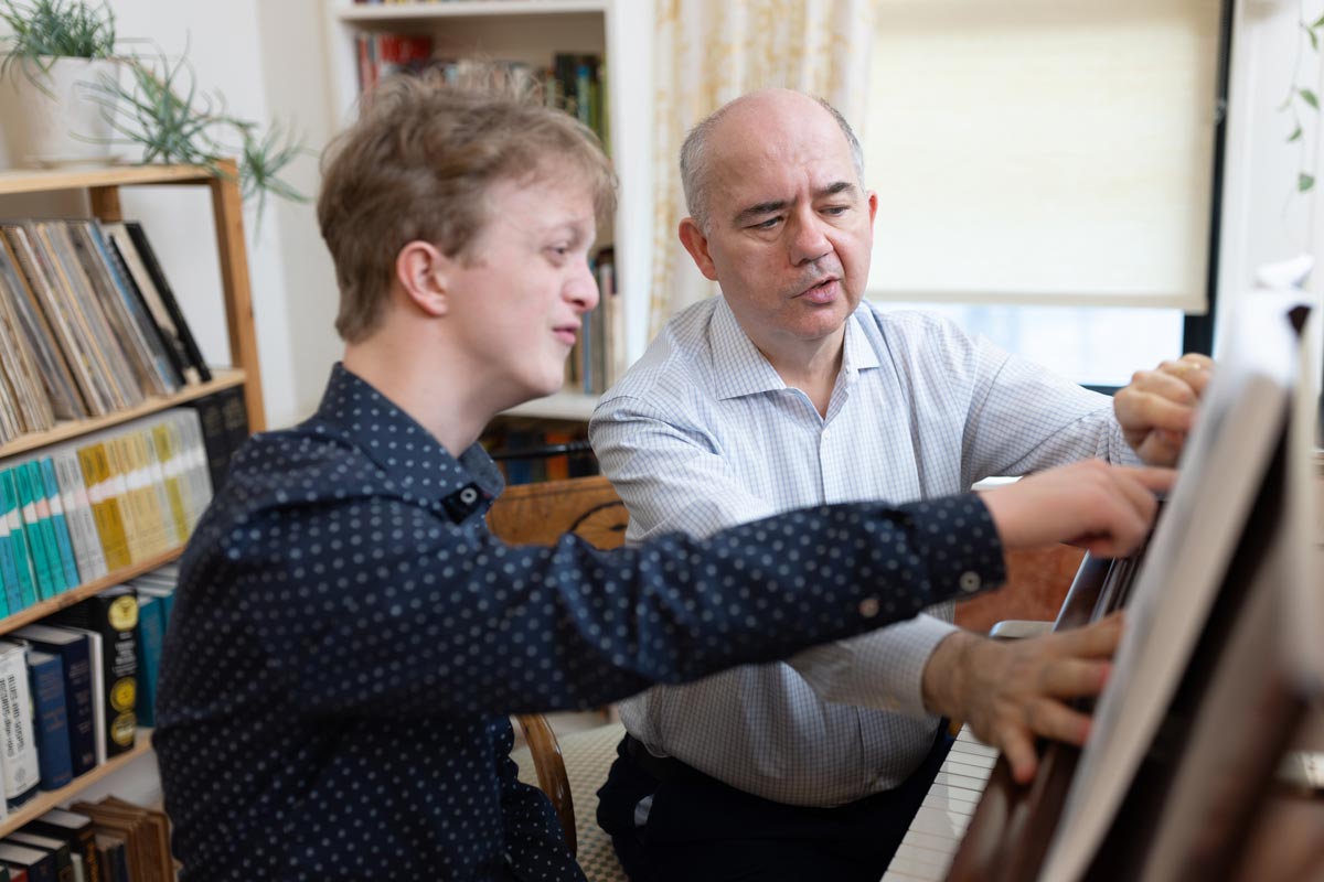 Peter Muir with John in a lesson
