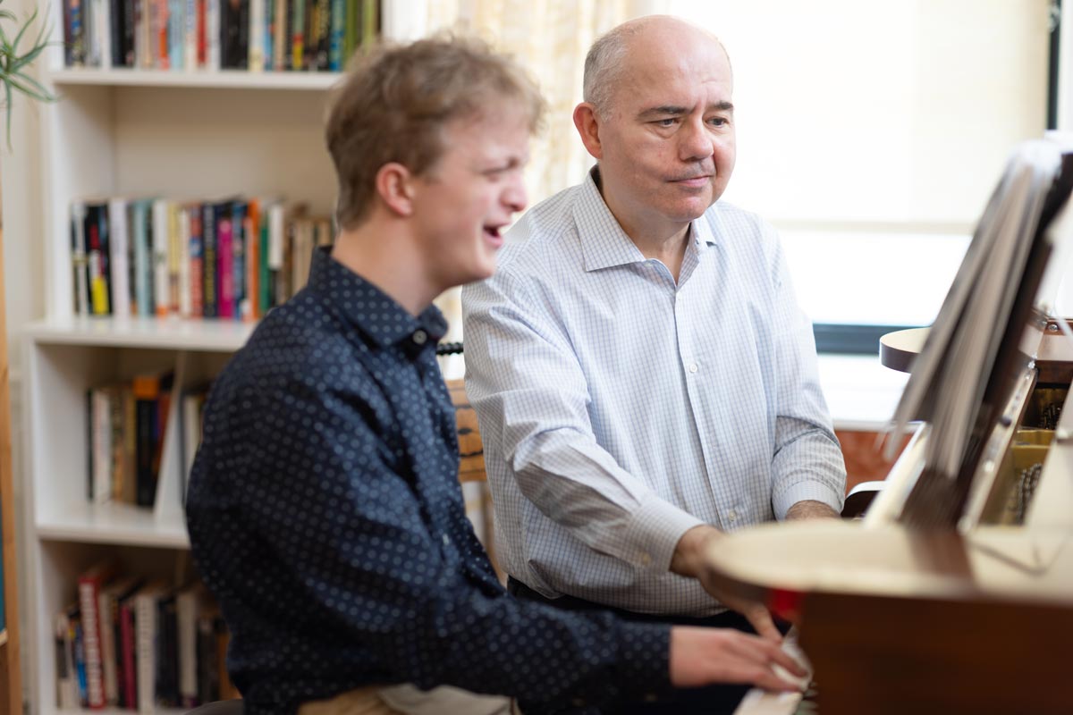 Peter Muir with John in a lesson