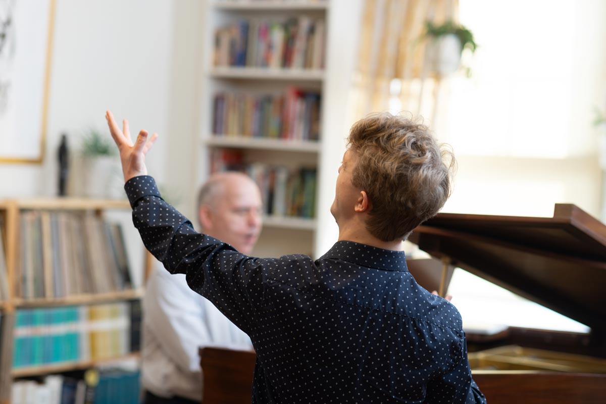 Peter Muir with John in a lesson