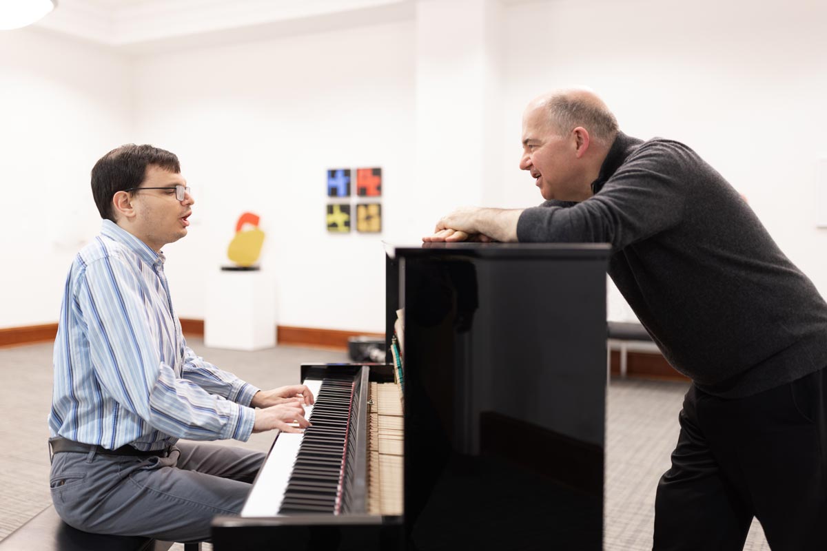Peter Muir with Michael in a lesson
